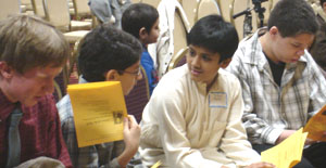 Photo of four tellers and little friend